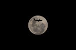 Photo by Michael Stolz. Supermoon on 14/6/2022, a Jetstar A-320 VH-VQF flew from the Goldcoast to Sydney and right in front of my lens. Shot in Neutral Bay, 600mm, handheld.