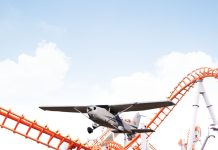 photo compilation of small aircraft flying low past a rollercoaster