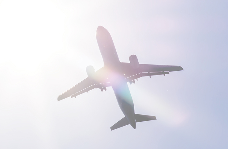 Aircraft flying in clear sky.