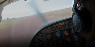 Pilot in an aircraft attempting a landing