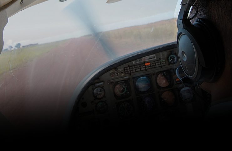 Pilot in an aircraft attempting a landing