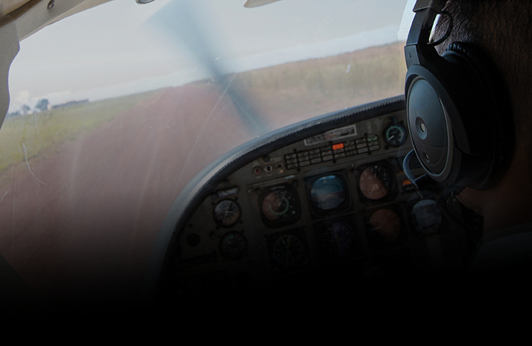 Pilot in an aircraft attempting a landing