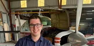 Luke getting ready to install an alternator on a A36 Bonanza