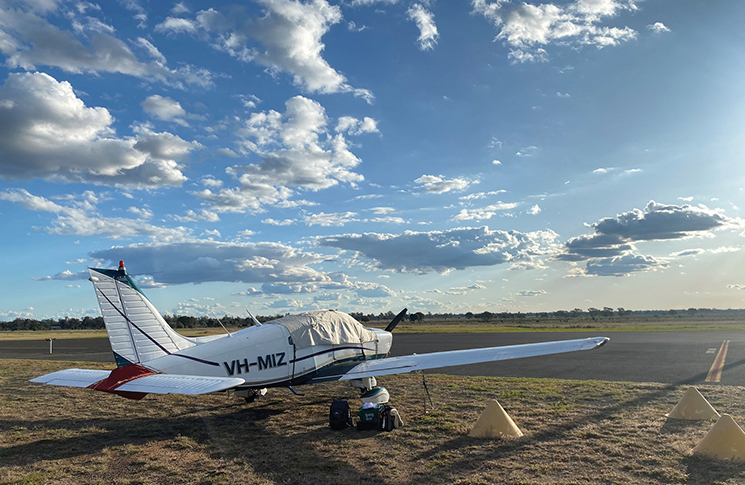 A stationary aircraft at Narrabri airfield.