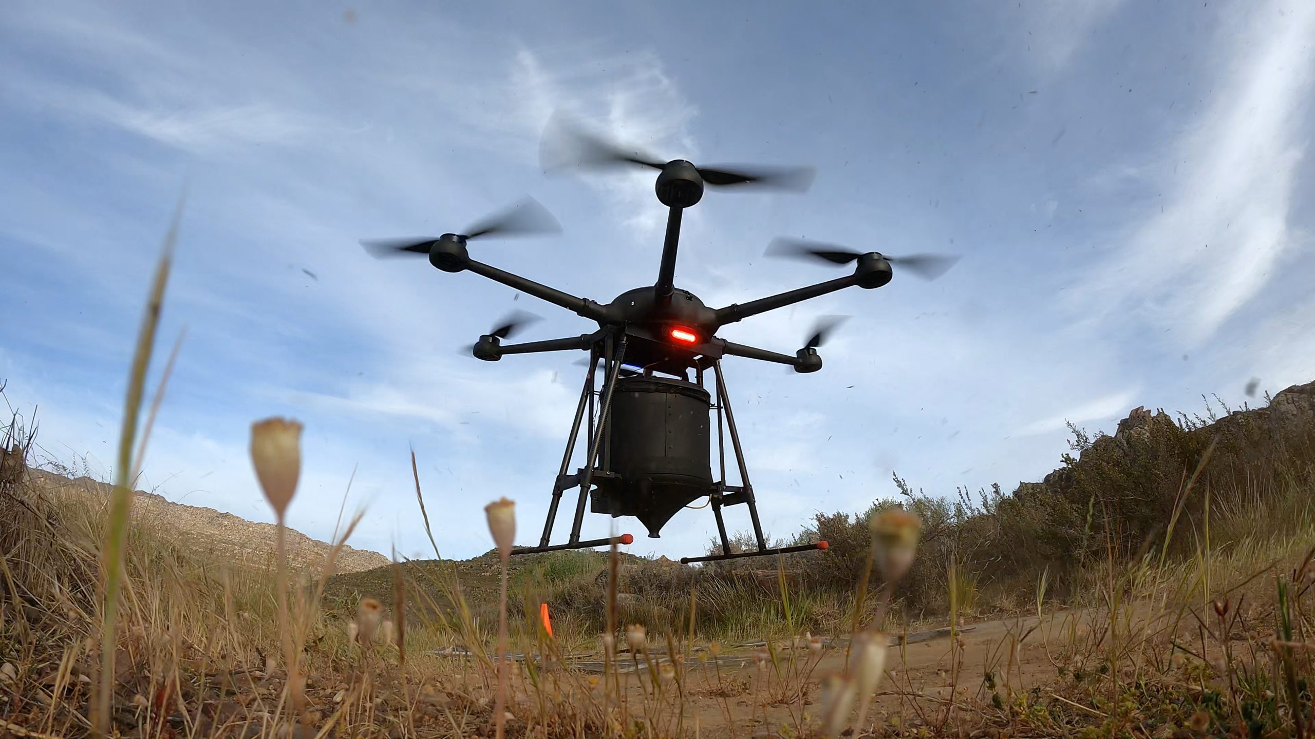 An AirSeed Artemis drone taking off