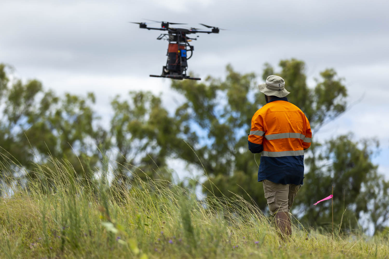 Chief pilot Ru in the field on a planting project