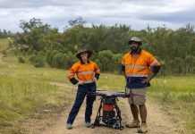 AirSeed’s chief ecologist Charlotte Mills and chief remote pilot Ru Maka at a project site in Queensland