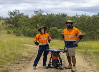 AirSeed’s chief ecologist Charlotte Mills and chief remote pilot Ru Maka at a project site in Queensland