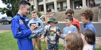Student ambassador Josh teaching youth from Armidale about drone safety.