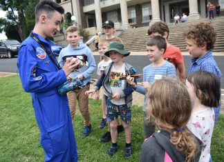 Student ambassador Josh teaching youth from Armidale about drone safety.