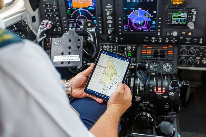 A Royal Flying Doctor Service pilot studying the weather | Bureau of Meteorology