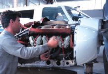 Aircraft engineer working on an engine.