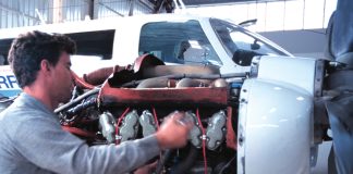 Aircraft engineer working on an engine.