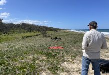 Peter from Aspect UAV flying the drone along the beach