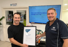 Jai Bradford (left) being presented with his scholarship by Rob Whittle, Acting Section Manager of CASA’s Industry Engagement.