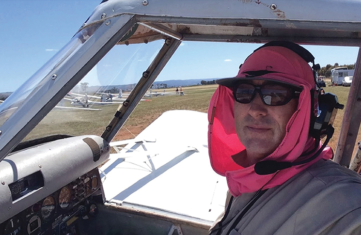 Photo of Roger Krueger in a glider