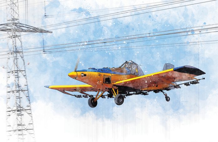 Illustration style image of a small aircraft flying close to powerlines