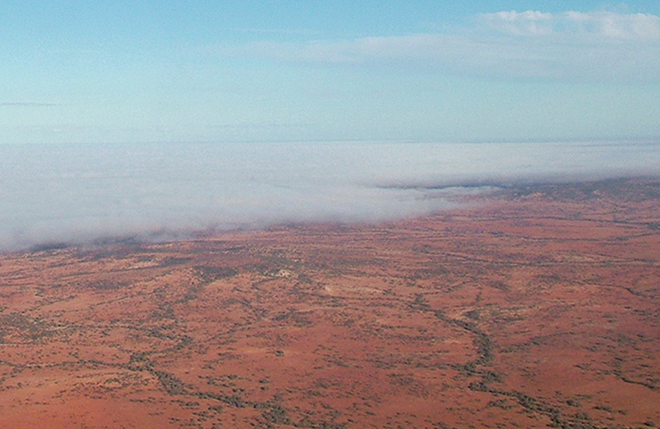 Aerial shot of fog rolling in over Noccundra.