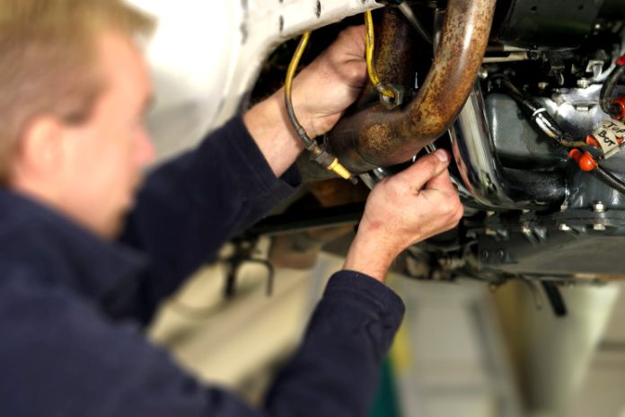 Engineer working on a Cirrus SR22 aircraft.
