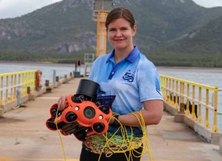 image: Melanie Olsen holding a Chasing M2 Pro drone, December 2022 | Australian Institute of Marine Science, Marie Roman