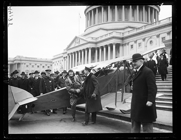 image of an aeroplane in front of US Capitol, Washington, DC