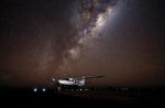 A Cessna 208B EX surrounded by the night sky