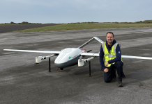 Grant Eaton on the tarmac pre-flight with a drone