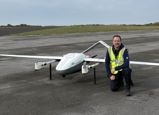 Grant Eaton on the tarmac pre-flight with a drone