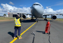 Taking a different route to the skies Aircraft maintenance engineer Aaron Pollard performing maintenance on an aircraft.