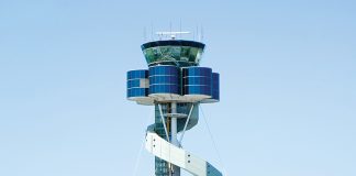 A large airport control tower with a spiral staircase. AI generated content