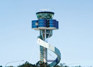 A large airport control tower with a spiral staircase. AI generated content