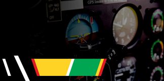 A cockpit with gauges and a GPS.