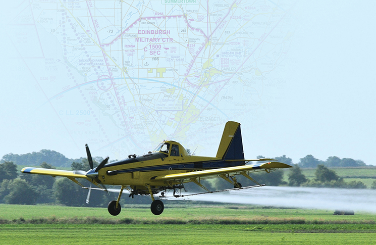 Mix-up in the salad bowl1 An aeroplane spraying a field, with an airspace map superimposed over the sky behind it