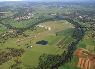 IFR quiz: Autumn 2025-26 Aerial view of an aerodrome surrounded by green fields