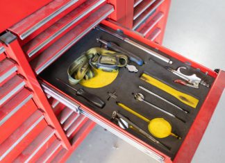 That last step before releasing an aircraft or component to service A set of tools sitting in their individual spaces in a red toolbox