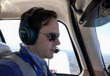 A pilot talking on their radio