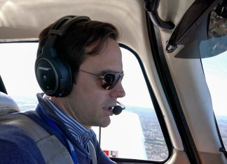 Talking to the tower in controlled airspace A pilot talking on their radio