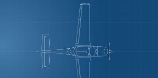 The outline of an aeroplane seen from above on a dark blue background