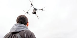 A man flying a drone