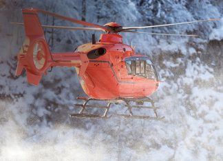 Helicopter quiz: Winter 2026 A helicopter flying with snowy trees in the background