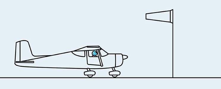 A line drawing of an aeroplane on the ground, with a windsock next to it