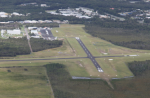 When the picture doesn’t match the call: Intersecting runways at non-controlled aerodromes Aerial view of Caloundra Airport showing intersecting runways in a non-controlled environment.