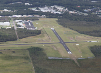 When the picture doesn’t match the call: Intersecting runways at non-controlled aerodromes Aerial view of Caloundra Airport showing intersecting runways in a non-controlled environment.